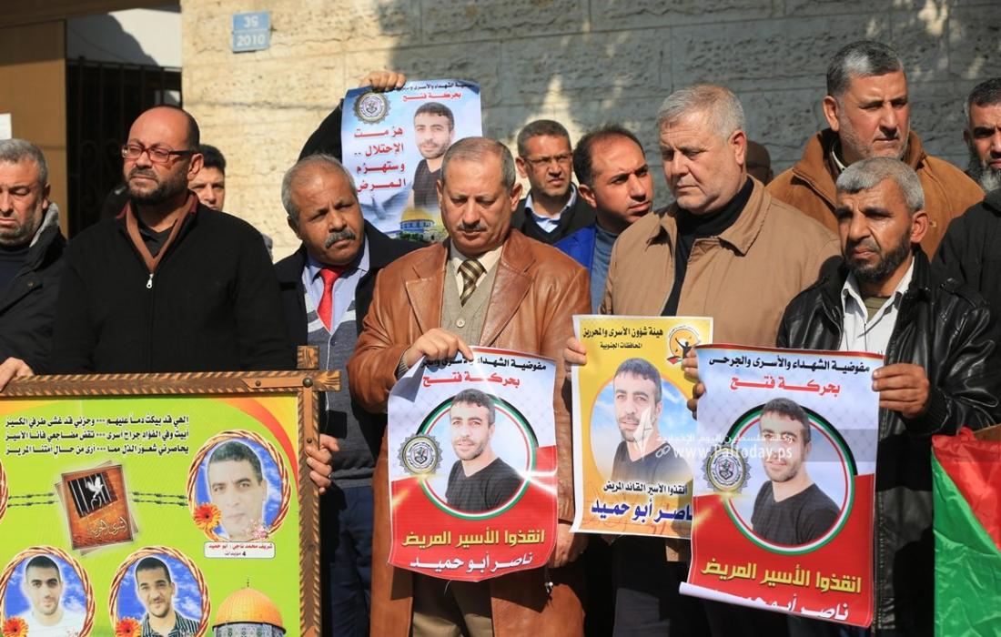 لجنة الأسرى للقوى الوطنية والإسلامية بغزة تنظم وقفة تضامنية مع الأسير  المريض ناصر أبو حميد (11).jpg